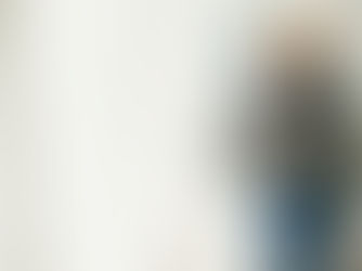 Young woman using a laptop for CV writing and job application support in New Zealand