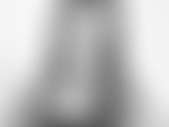 FutureFLEX trainer and owner Kathy with long blonde/brown hair, black top, hands on hips, smiling at the camera