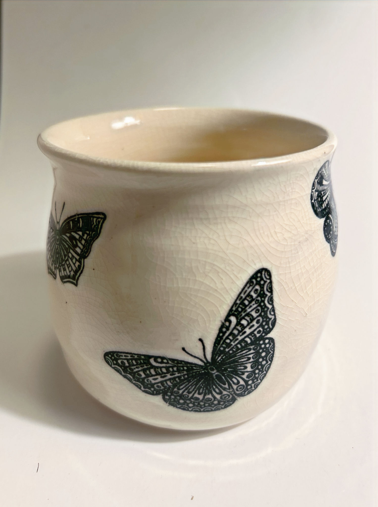 Butterfly on bone vase