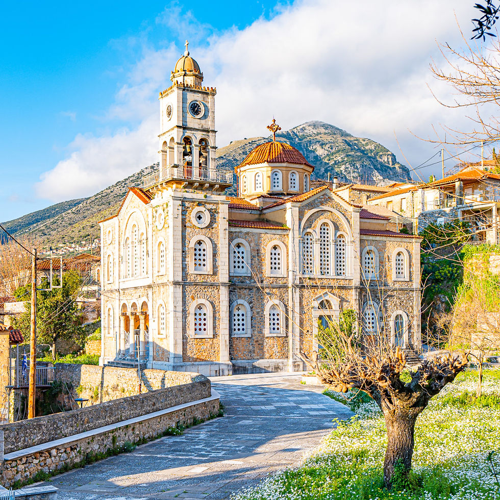 Main church in Exochori with Taygetos mountain range in the background