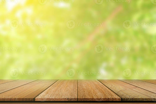 empty-wooden-table-on-green-nature-blurred-background-for-product-display-photo.jpg