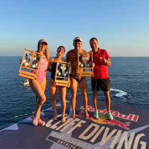 Molly Carlson, Simone Leathead, Aidan Heslop, and Stéphane Lapointe on a diving board at the 2024 Cliff Diving World Series