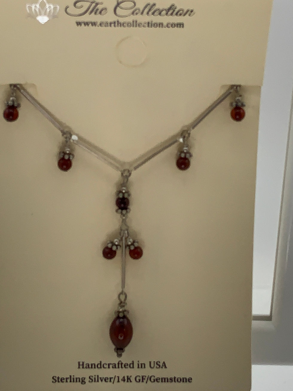 Thumbnail: Garnets wrapped on Sterling Silver Chain