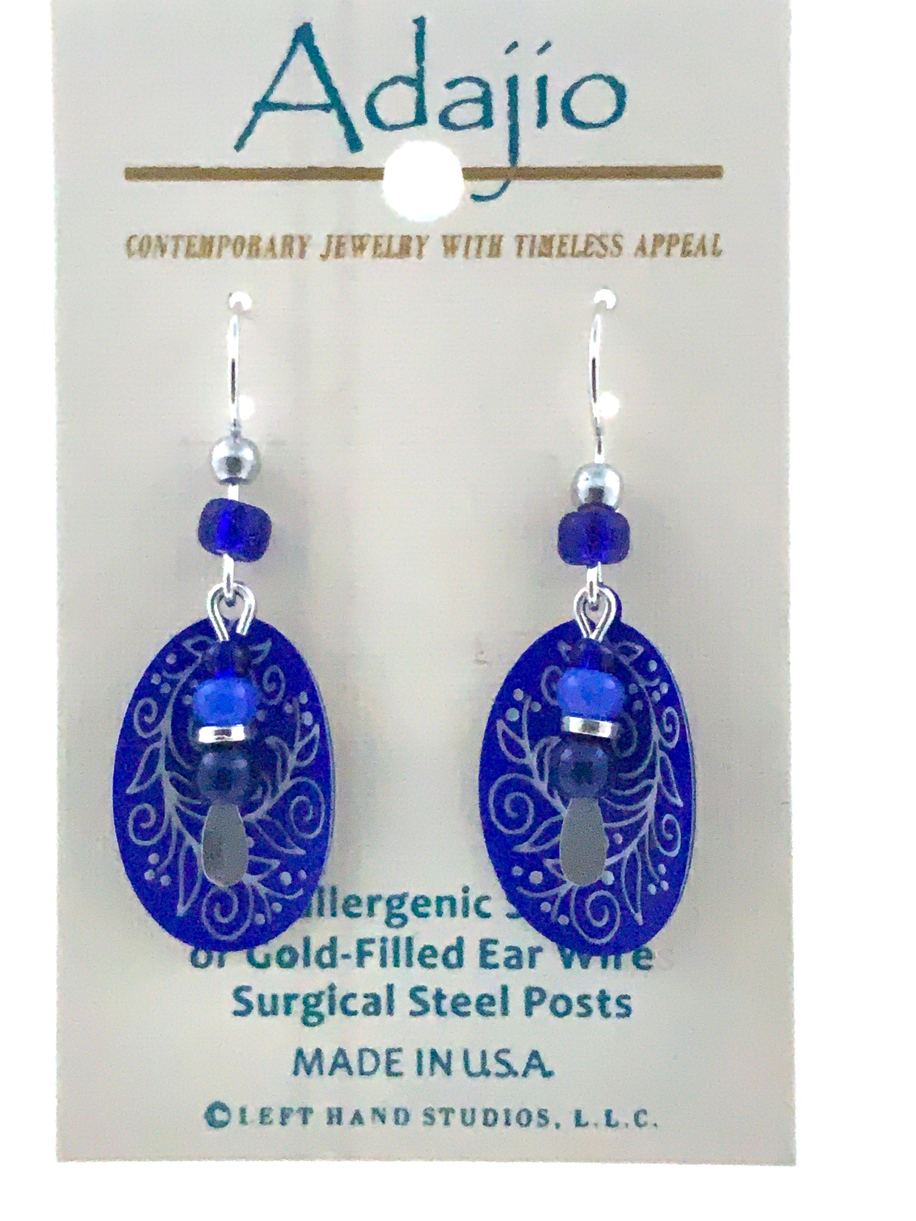 Laser cut enameled disc layered with glass beads with sterling silver