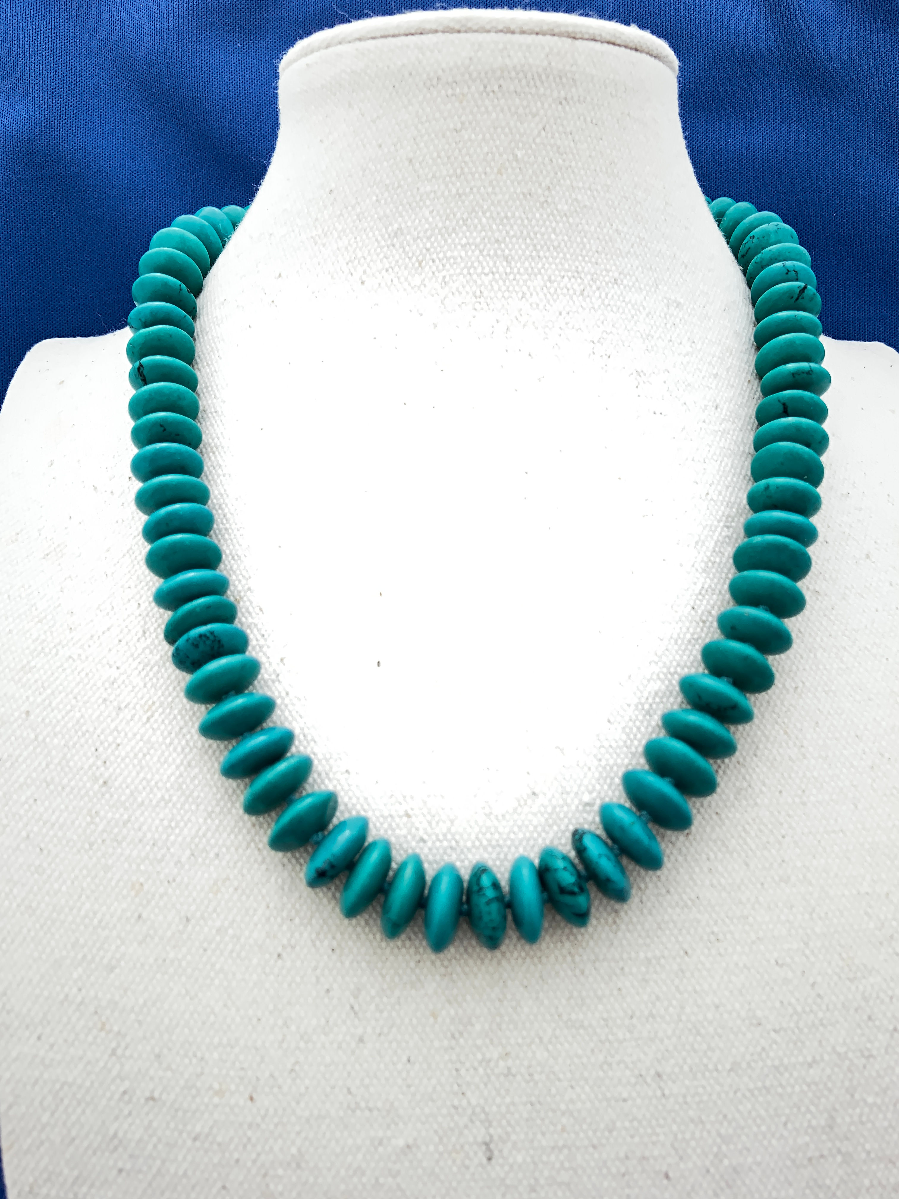 Turquoise discs hand knotted on sterling Silver