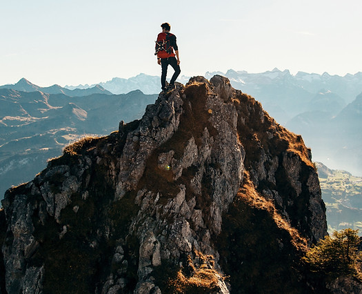 Mountain climber on peak