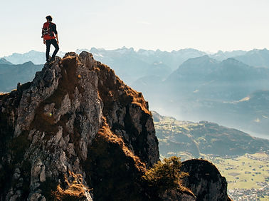 Mountain climber on peak