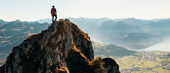 Mountain climber on peak