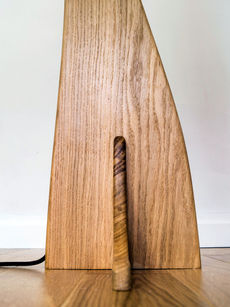 close up of wood floor lamp as part of hand made nature inspired furniture