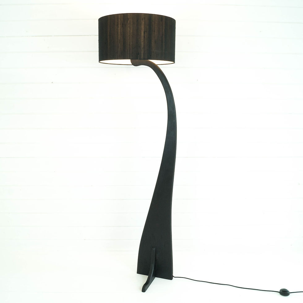 Thumbnail: Black curved floor lamp with cylindrical shade
