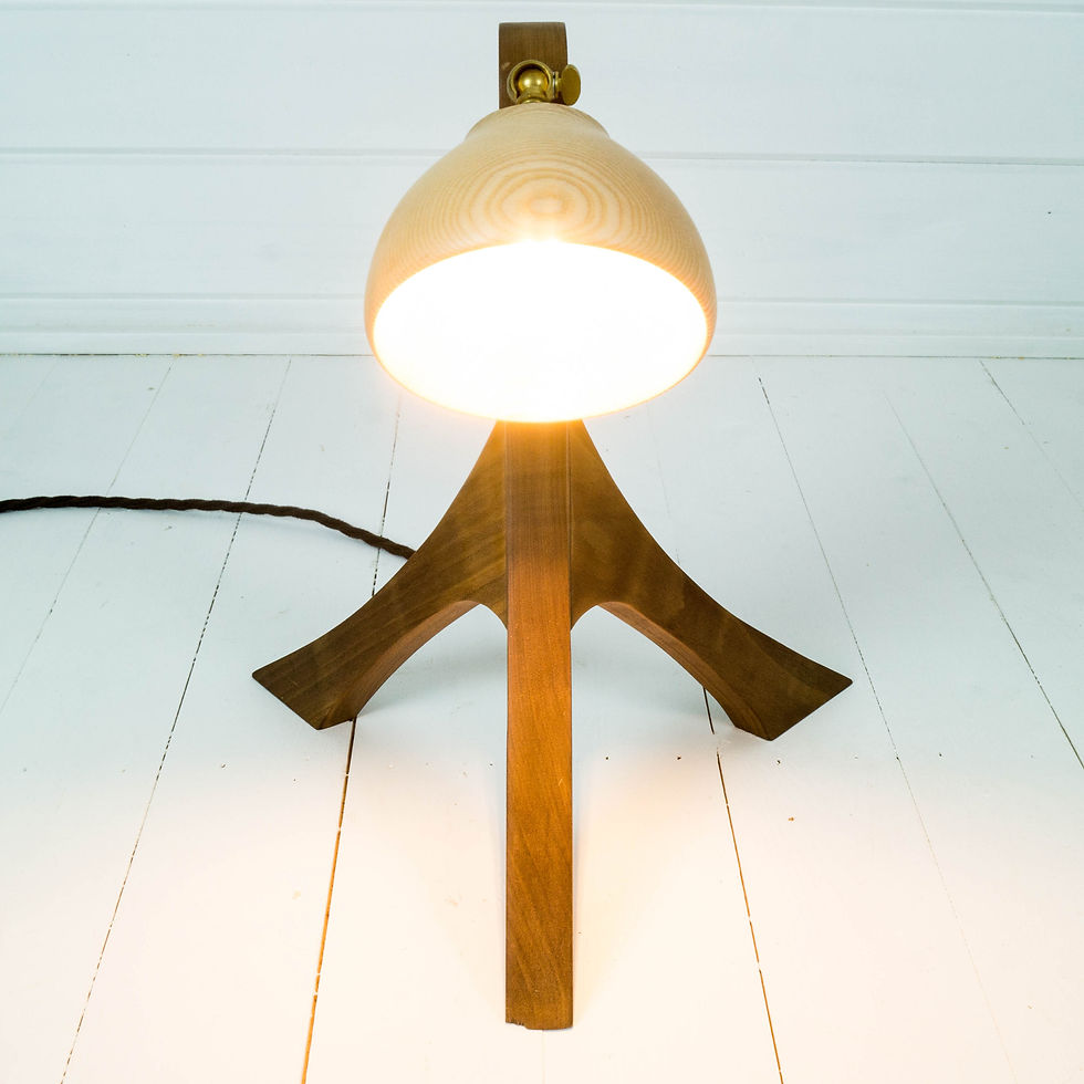 Thumbnail: Wooden tripod table lamp, glowing light