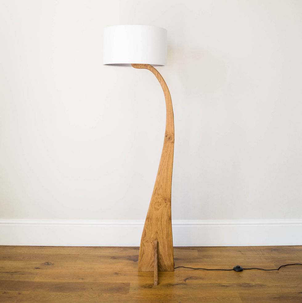 Thumbnail: Curved wooden floor lamp with white shade