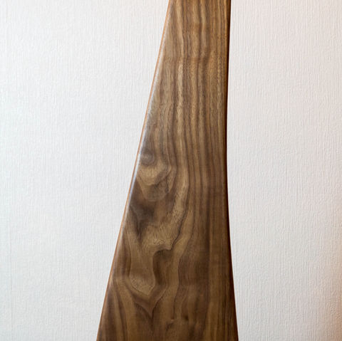 closeup of woof floor lamp as part of hand made nature inspired furniture