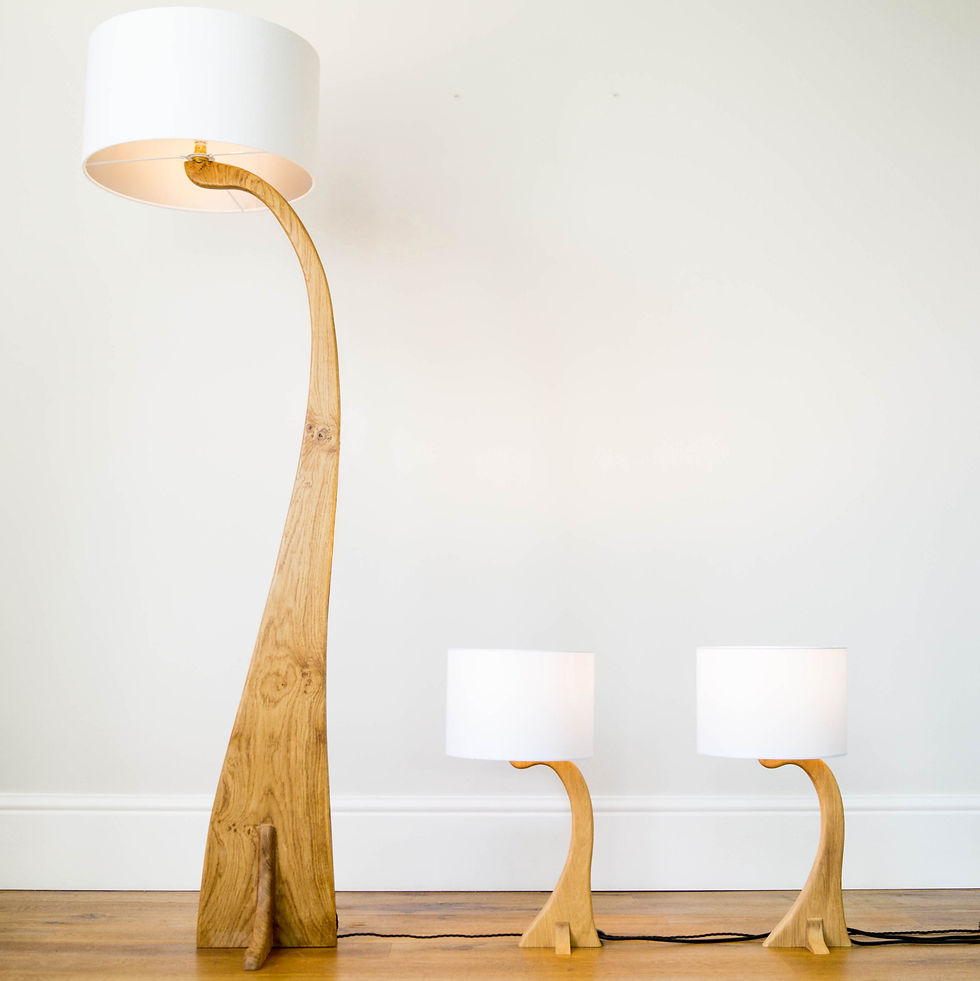 Thumbnail: Tall curved wooden floor lamp with two matching table lamps