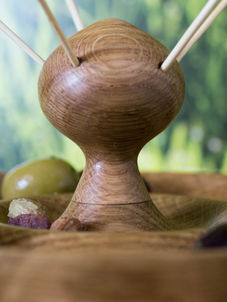 Wooden olive bowl droplet shape as part of hand made nature inspired furniture