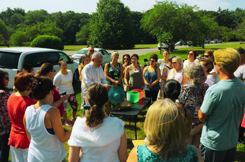 dean telano teaching an outdoor crystal singing bowl course