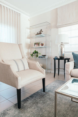 Custom occasional chair in off white fabric and bespoke cushion