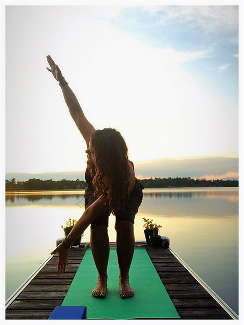 Based in Carbdonale, PA | Lackawanna County, PA | Joy Zazzera, Yoga Medicine Therapeutic Specialist, Master Meditation Teacher, Massage Therapist shown practicing Twisted Chair Pose with Arms Reaching in a "V" Shape