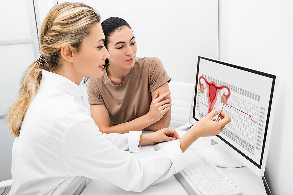 Female physician educating a patient on ovulation.