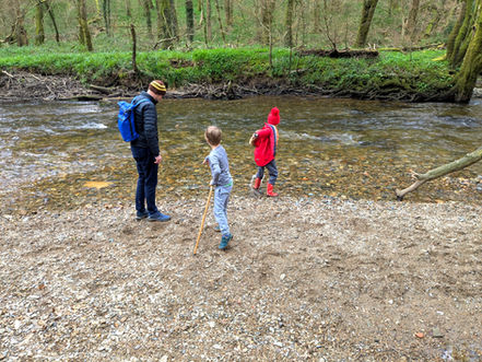 Father and autistic kids playing in River Avon, Salcombe, Devon
