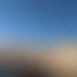 Steps leading down the city wall to Spiaggia di Cala Rossa - a great swimming spot on Ortigia Island, Syracuse