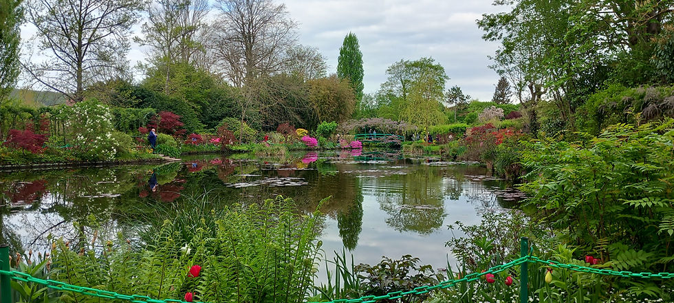 Monet garden giverny water lily pond with green japanese bridge accessible sensory travel for autistic children.