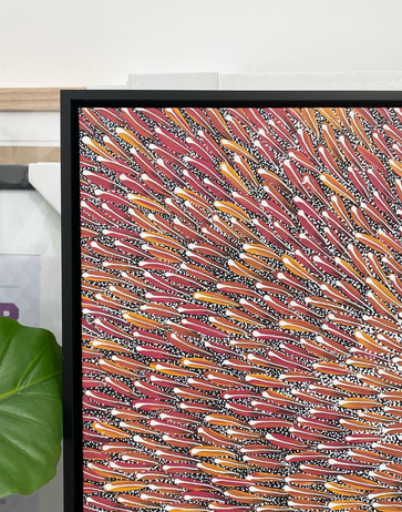 Australian Indigenous Artwork Painted on Black Primed Canvas. Stretched on Kiln Dried Pine Stretcher Bar and Float Framed in Solid Black Timber.