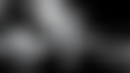 Black and white abstract image of freight containers and digital infrastructure overlays, representing complex global supply chain vulnerability across logistics, data systems, and operational networks—featured in Emergent Line’s 3-layer assessment framework for mid-sized companies.