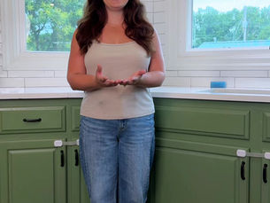 Missy opens the first prototype for her new apron