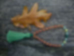Hand knotted mala beads and autumn leaf