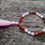 Thumbnail: Pink and red beaded mala bracelet