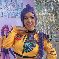 Kpop Rumi party character posing for photos at music themed celebration in Broward County Florida