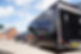 Carscierge car transport vehicle and covered trailer ready for collection