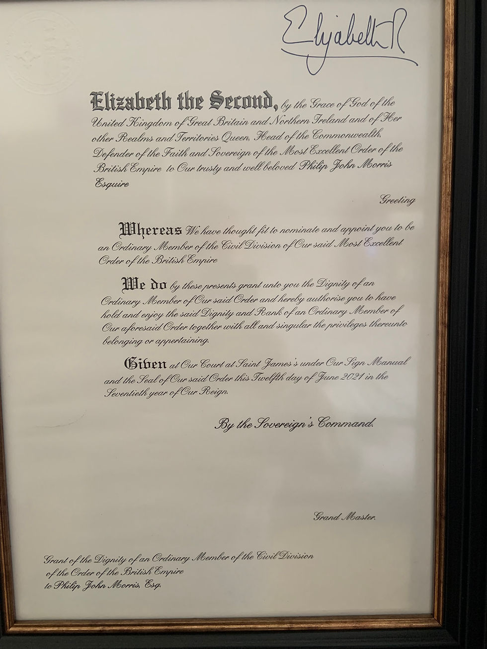 parchment from queen Elizabeth for MBE at Windsor castle investiture order of the british empire
