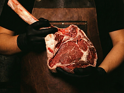 Butcher-holding-beef.png