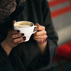 Woman Holding Coffee Cup