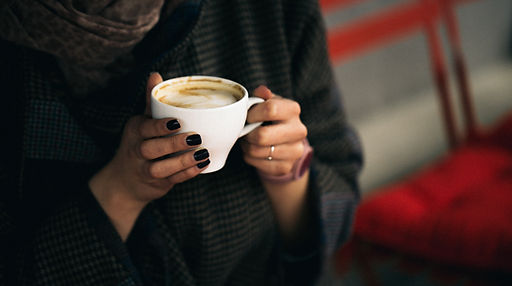 Woman Holding Coffee Cup