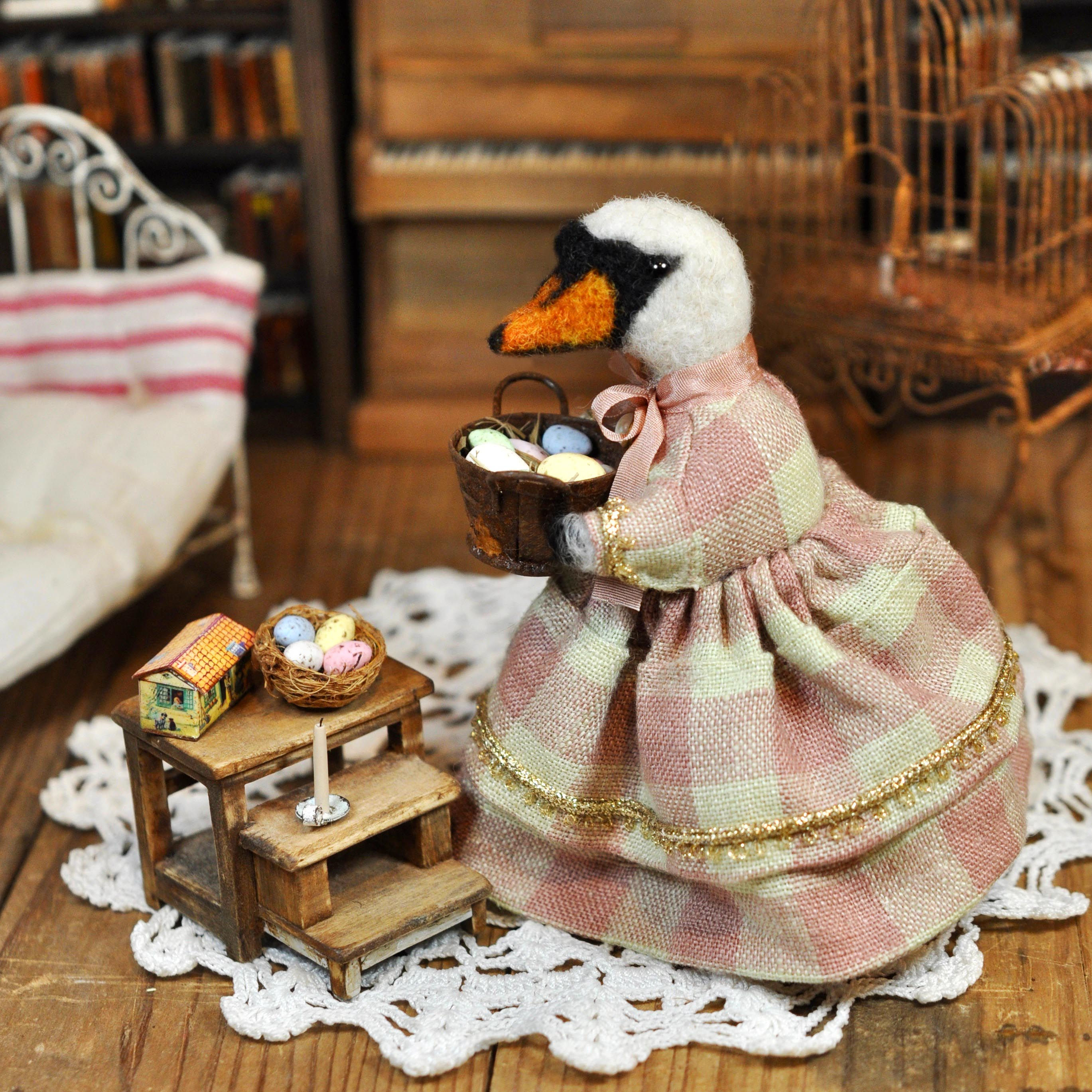 Little Mrs Swan and her precious eggs