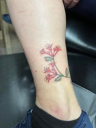 honeysuckle tattoo by female tattoo artist