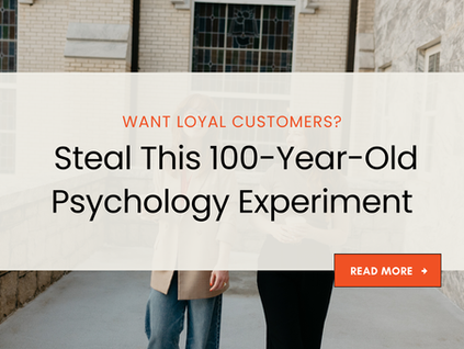 Marketing graphic with headline text that reads ‘Want Loyal Customers? Steal This 100-Year-Old Psychology Experiment’ over a faded background of two women talking outside a stone building. A red button in the corner says ‘Read More.’