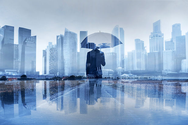 Man with umbrella in the city