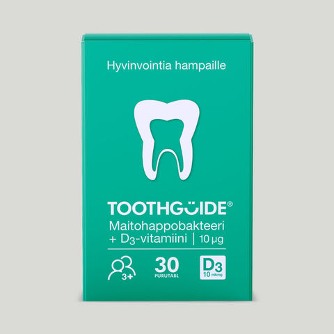 ToothGuide®-bakteerilisän pakkaus, jossa vihreällä pohjalla on kohopainettu valkoinen hammas