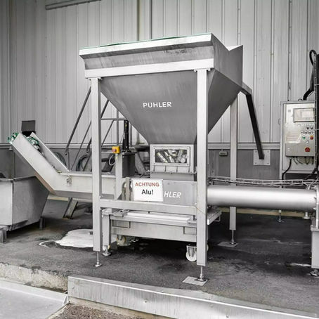 Recycling of cans and disposal of labels at OeTTINGER using PUEHLER presses from WEIMA