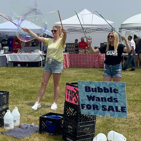 Spreading the word of the wands and bubbles.