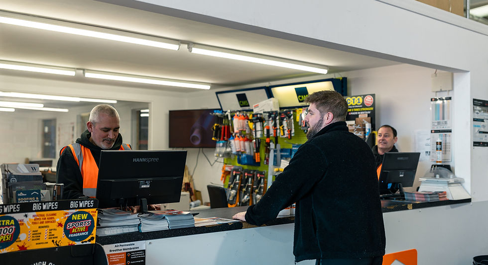 Customer at a roofbase branch buying roofing supplies 