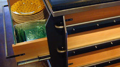 The timeless beauty of the custom kitchen island, crafted from douglas fir, blackened steel, and granite, is unmistakable. The warm hues of the wood perfectly complement the sleekness of the steel, while the luxurious touch of durable granite further enhances its appeal. This exceptional fusion not only improves the kitchen's functionality but also raises its visual charm. Whether utilized for cooking, relaxed dining, or hosting visitors, this personalized island is guaranteed to command attention in the room.