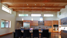 Passive solar greatrooms are strategically planned to optimize natural light and solar heat utilization. These spaces commonly feature expansive window elements that enable sunlight penetration, thereby warming the area throughout the day. The design further incorporates thermal mass components, like concrete or stone, to absorb and retain heat, gradually emanating warmth to maintain a comfortable interior during nighttime. This eco-friendly design not only lowers dependency on artificial heating and lighting systems but also fosters a pleasant and hospitable environment for inhabitants to relish.