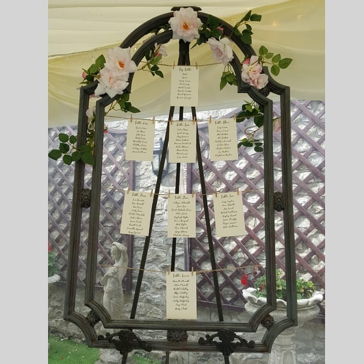 Faux metal frame with faux flowers