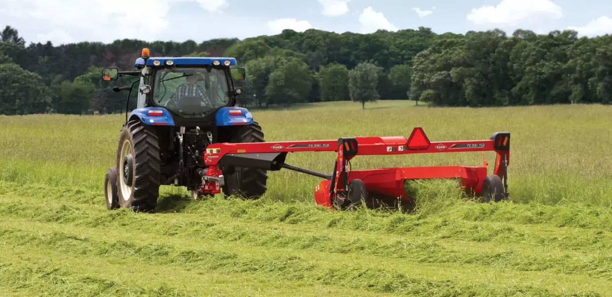 FC 61 Tl Series Side-Pull Mower Conditioner in field, attached to tractor rear