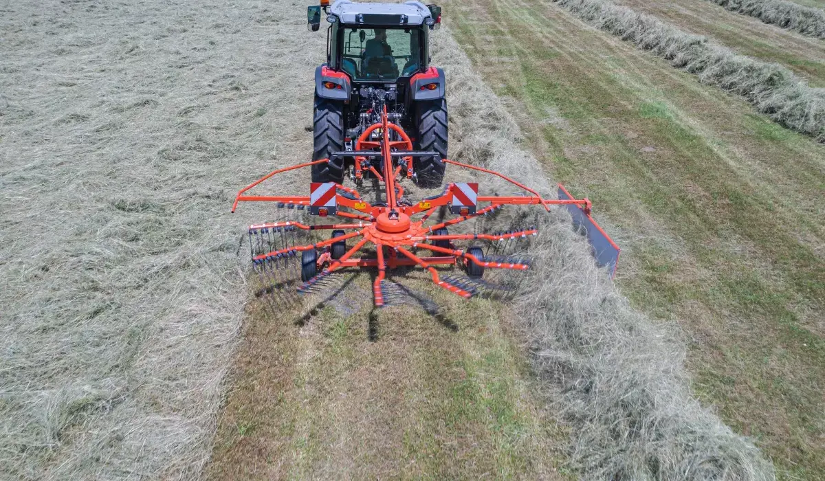 GA 4201 / 4401 Single-Rotor, Mounted Rotary Rake attached to tractor rear, in field